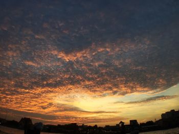 Scenic view of dramatic sky during sunset