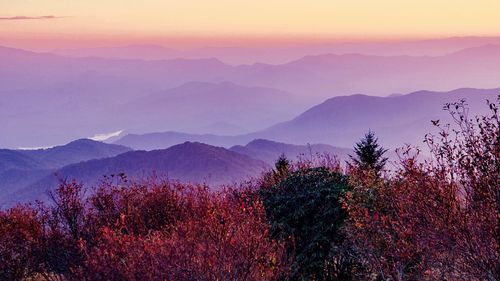 Scenic view of mountains against sky during sunset