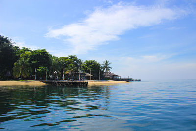 Scenic view of sea against cloudy sky