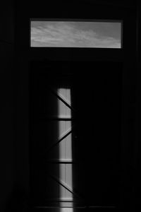 Closed window in dark room