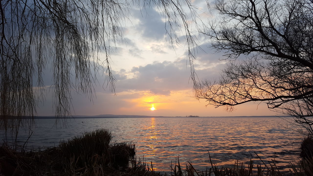 SCENIC VIEW OF SEA DURING SUNSET