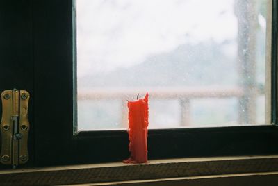 Close-up of window against sky