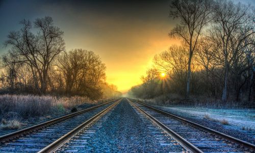 Railroad track at sunset