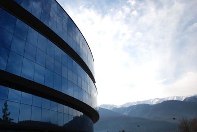 Low angle view of modern building against sky