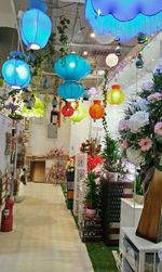 Multi colored balloons hanging on clothesline