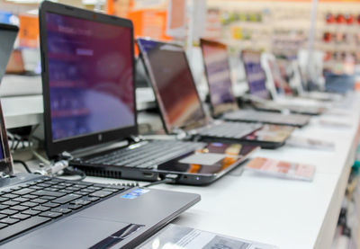 Laptops on table in store