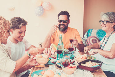 Family eating at dining table