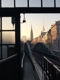 View of bridge over river in city