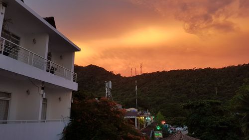 Buildings against sky during sunset