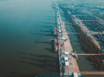 Aerial view of freight transportation on sea in city