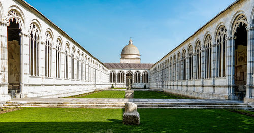 Courtyard of composanto monumentale against sky