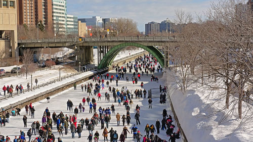 High angle view of crowd in city during winter