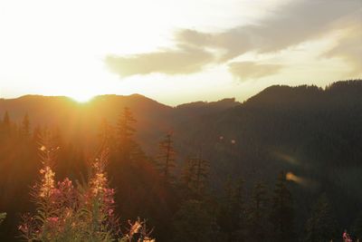 Scenic view of mountains against sky during sunset
