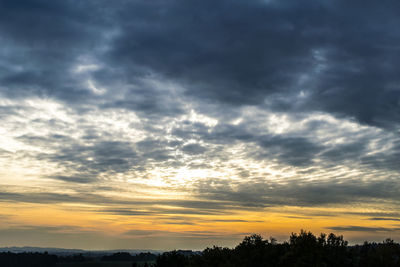 Scenic view of dramatic sky during sunset