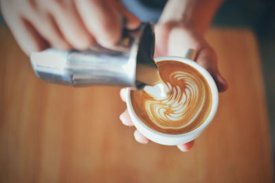 Close-up of coffee cup on table