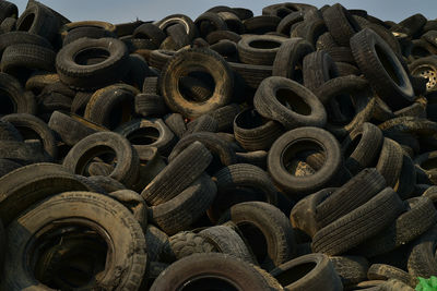 Full frame shot of abandoned tires at junkyard