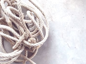 Close-up of rope against wall