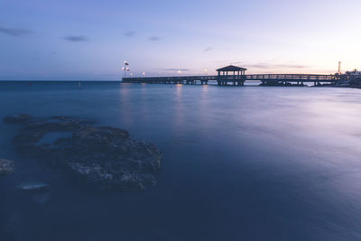 Scenic view of sea against sky at sunset