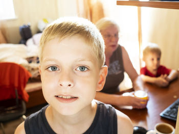 Portrait of boy at home