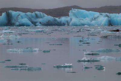 Scenic view of ice floating on sea