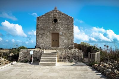 View of church against cloudy sky