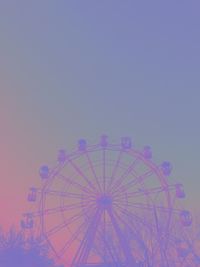 Amusement park against clear sky