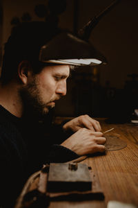 Portrait of man holding camera