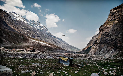 Scenic view of snowcapped mountains against sky