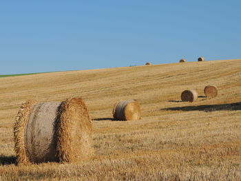 Scenic view of landscape against clear blue sky