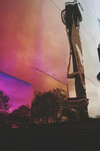 Low angle view of power lines against sky