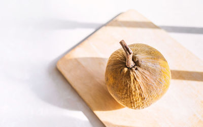 High angle view of apple on table