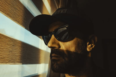 Close-up of young man wearing sunglasses