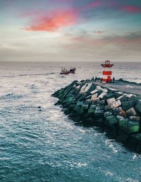 Scenic view of sea against sky during sunset