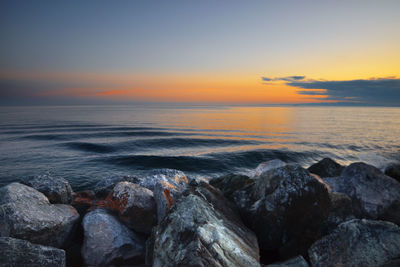 Scenic view of sea against sky during sunset