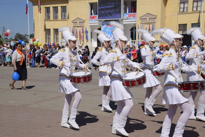 Group of people on street in city