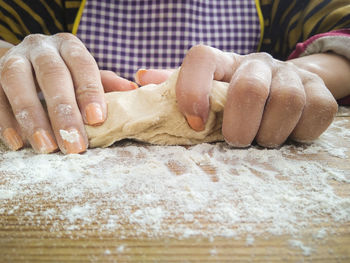 Close-up of person preparing food