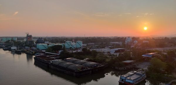 High angle view of buildings against sky during sunset