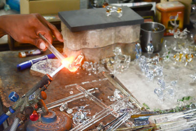 Close-up of man working at industry