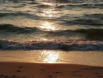 Scenic view of beach during sunset