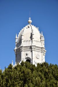 Low angle view of cathedral against clear sky during sunny day