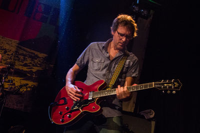 Young man playing guitar