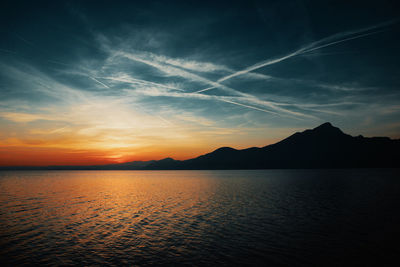 Scenic view of sea against sky during sunset