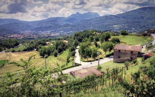 Scenic view of landscape and mountains against sky