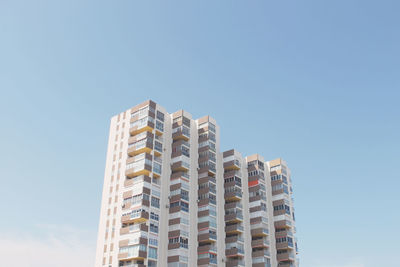 Low angle view of modern building against clear sky