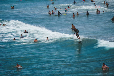 High angle view of people in sea