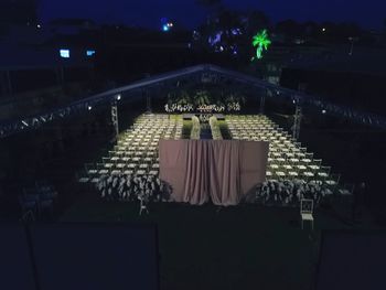 High angle view of illuminated chair at night