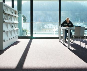Close-up of woman sitting on bench