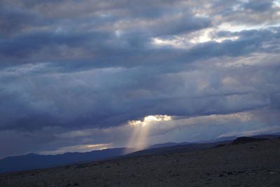 Storm clouds over land