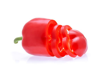 Close-up of red bell pepper against white background