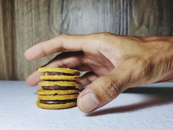 Close-up of hand holding ice cream